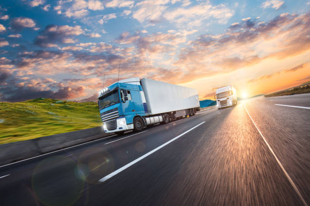 istock Truck with container on road, cargo transportation concept. 1190046563