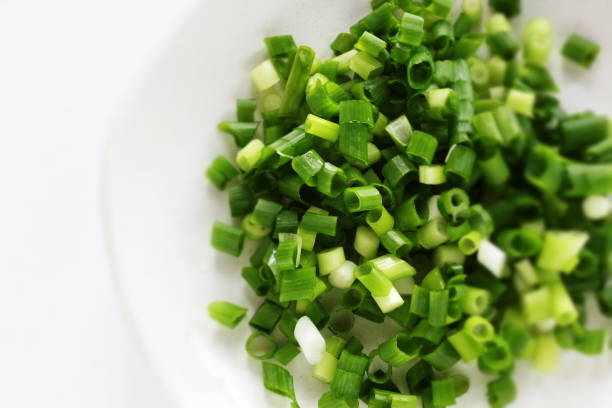 istock Chopped green onion on dish 1190047102