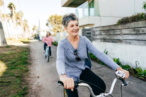 istock Active senior women on the bike 1190049302