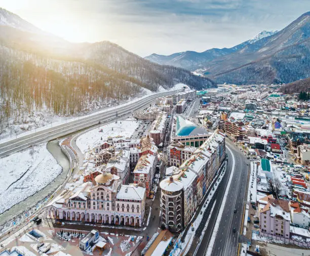 Aerial view of Estosadok settlement in valley under ski resorts of Sochi in Krasnodar Krai, Russia