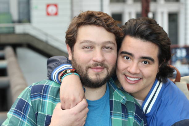 istock Interracial gay couple holding hands 1190049529
