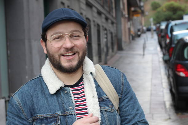 istock Hipster smiling on the street 1190049542