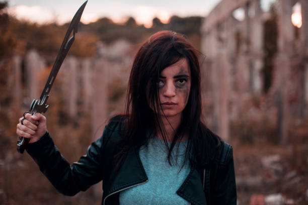 istock Post apocalyptic woman with a sword 1190059153