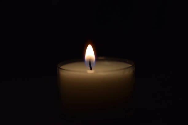 istock Candles glowing in the dark 1190069070
