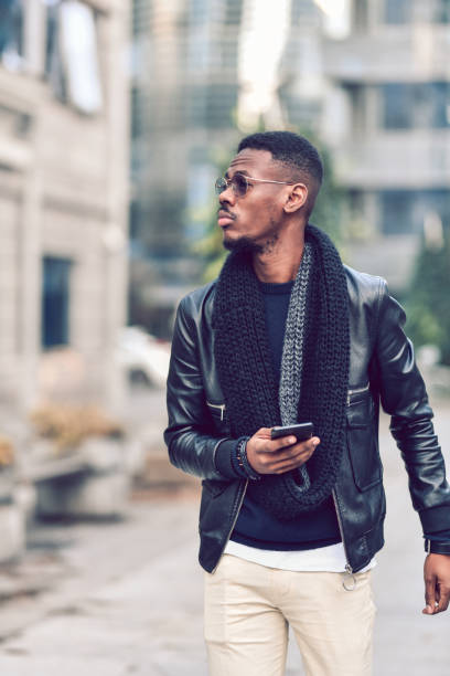 istock Elegant African Male Using GPS On Smartphone For Navigation 1190069975