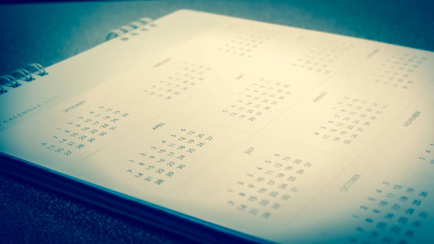 istock Blurred calendar on blue tone in planning concept. 1190073057