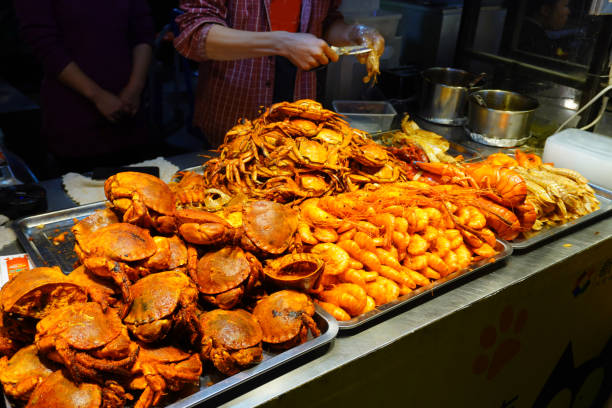 istock Local catched crab and prawn grilled stall. 1190076814