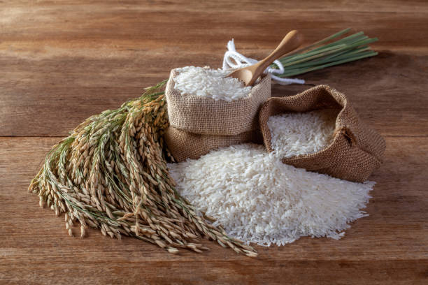 istock White rice (jasmine rice) in a sack on a wooden background 1190084238
