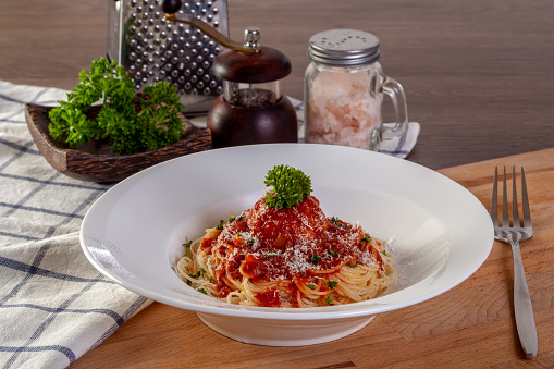 Spaghetti pasta with meatballs and tomato sauce.