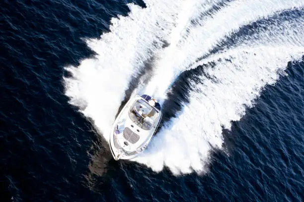 Fast speedboat racing along the open sea
