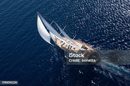 istock Luxury sailboat sailing in the open blue sea 1190093234