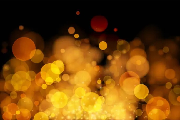 Vector illustration of Abstract vector gold bokeh background.