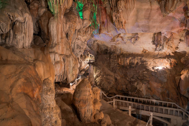 istock pathway underground cave in Laos, with stalagmites and stalactites 1190097453