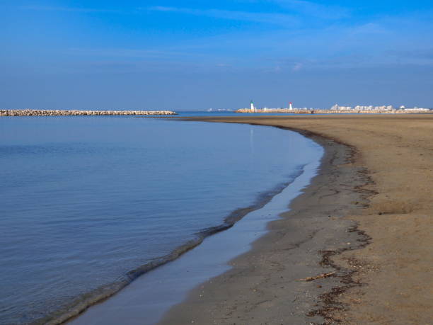 istock beach, groyne and lighthouses 1190097833