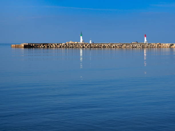 istock green and red lighthouses 1190097854