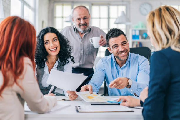 istock Group of coworkers working in modern office 1190099864