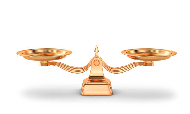 istock Copper balance scales isolated on white 1190102691