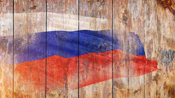 istock Grunge Russian flag on wooden background 1190103017