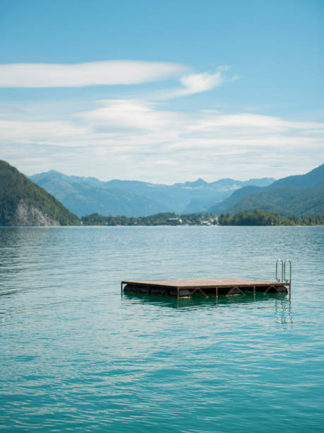 istock Empty wooden pier floating at lake 1190107515