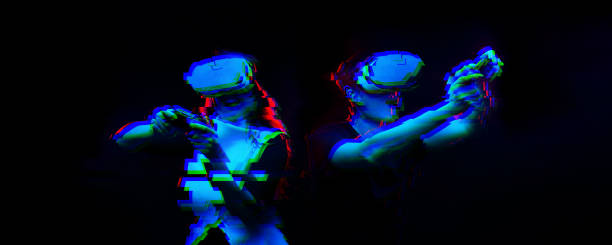istock Couple with virtual reality headset are playing game. Image with glitch effect. 1190108004