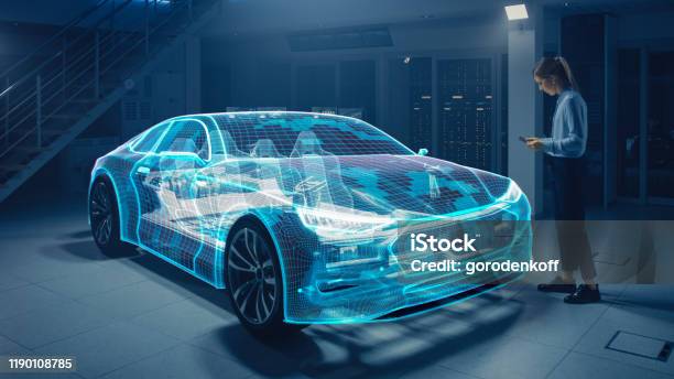 Female Automotive Engineer Uses Digital Tablet With Augmented Reality For Car Design Editing And Improvement 3d Graphics Visualization Shows Fully Developed Vehicle Prototype Analysed And Optimized Stock Photo - Download Image Now