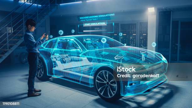 Automotive Engineer Uses Digital Tablet With Augmented Reality For Car Design Analysis And Improvement 3d Graphics Visualization Shows Fully Developed Vehicle Prototype Analysed And Optimized Stock Photo - Download Image Now