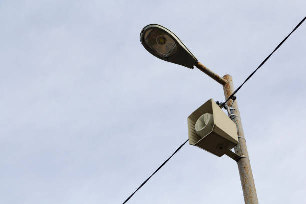 istock a loudspeaker on a street lamp post. The alarm notification. 1190115953