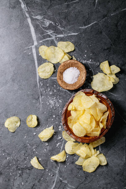 istock Bowl of home made potato chips 1190119972
