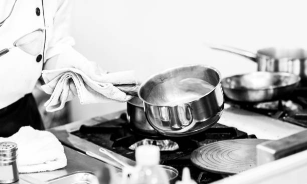 istock Chef preparing food, meal, in the kitchen, chef cooking, Chef decorating dish 1190122309