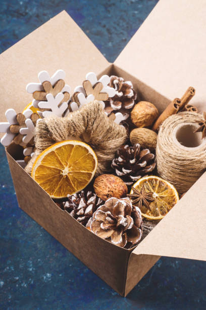 istock Eco friendly christmas with homemade natural decorations in a box. 1190122875