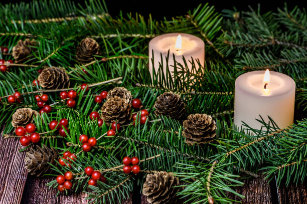 istock Decorated christmas tree branch on wooden table 1190123145
