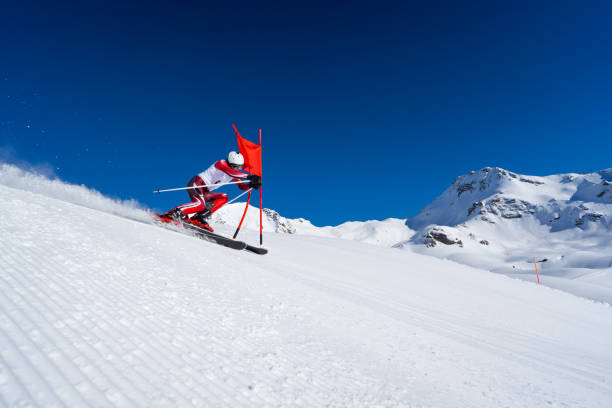 istock athlete skier touching goal-spot during super g training 1190124591