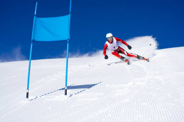 istock super g race, skier blurred, focus on flag 1190124595