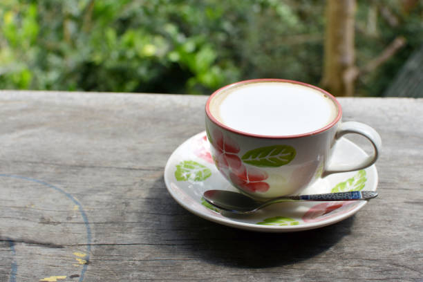 istock Morning coffee with nature background 1190124743