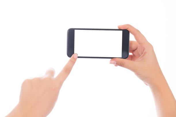 istock Smartphone with a blank white screen. New popular smartphone in hand on white background 1190126334