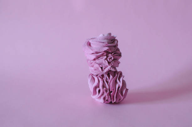 istock Homemade marshmallow berry zephyr on pink background 1190126410