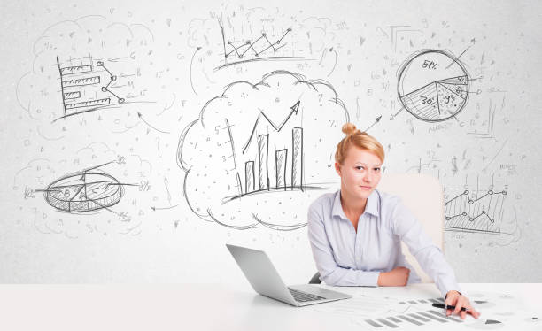 istock Business woman sitting at table with hand drawn graph charts 1190126490