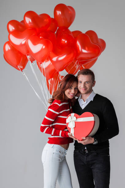 istock Valentines day couple with gifts 1190127784