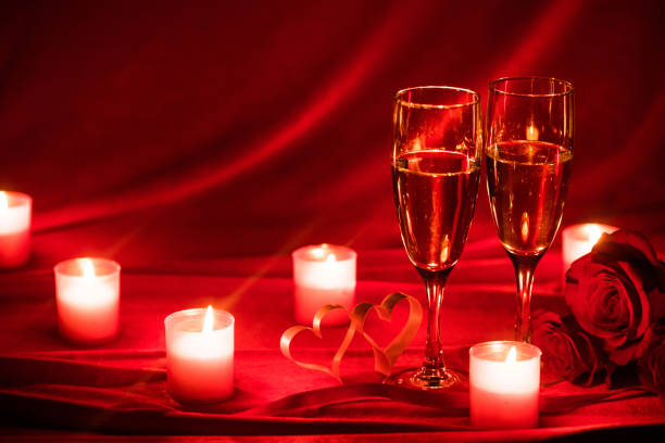 istock Champagne glasses and roses 1190127942