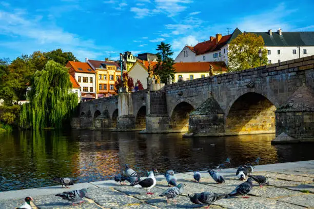 Cityscape of Czech town Pisek with stone bridge and old city