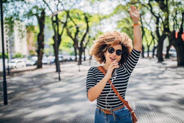 istock Lady singing on the street 1190130302