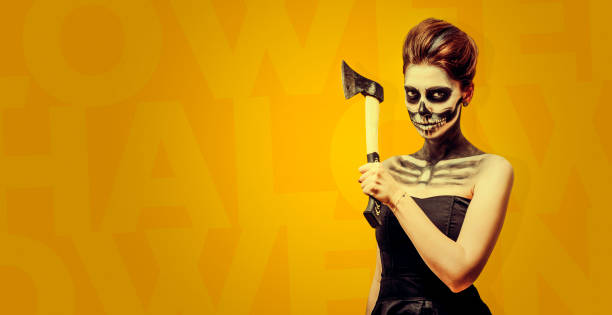 istock Woman with skull makeup 1190130968
