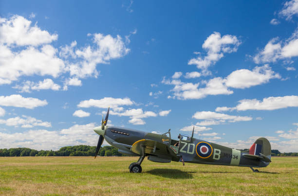 Supermarine Spitfire Mark IXb, MH434, England 2013 AUGUST 11 2013, Supermarine Spitfire Mark IXb World War Two fighter plane, parked by the grass runway at White Waltham Airfield, Maidenhead, England