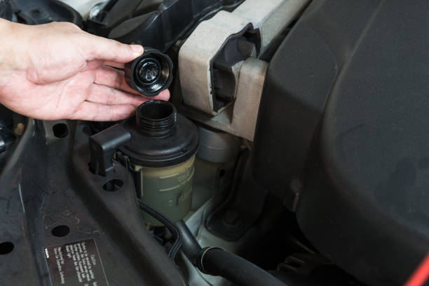 istock open up power steering fluid tank for check 1190132840