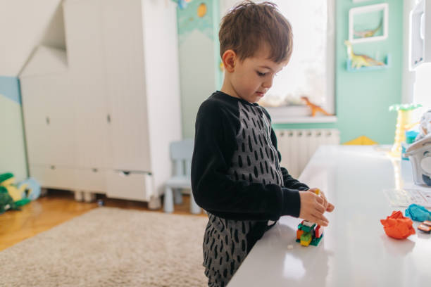 istock Little boy's playing in his room 1190132869