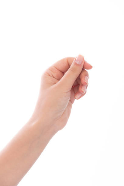 istock Woman's hand measuring invisible items on white background 1190132934