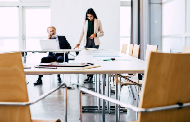 istock Defocused Board Room With Two People 1190133265