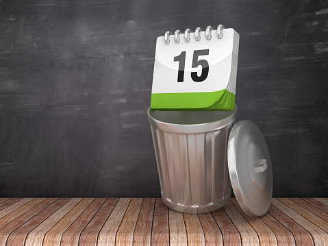Trash Can with DAY 15 Calendar on Chalkboard Background - 3D Rendering