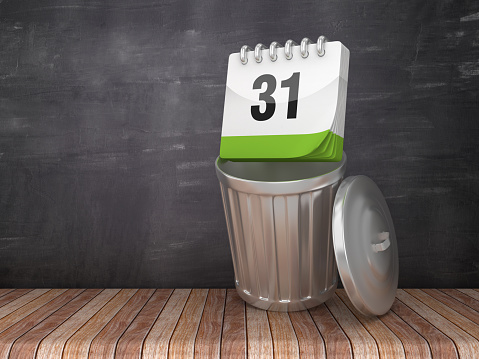 Trash Can with DAY 31 Calendar on Chalkboard Background - 3D Rendering