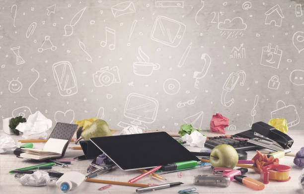 istock Design office desk with drawings background 1190135511